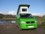 SX12383 Our green VW T5 campervan with popup roof up at Ogmore Castle.jpg